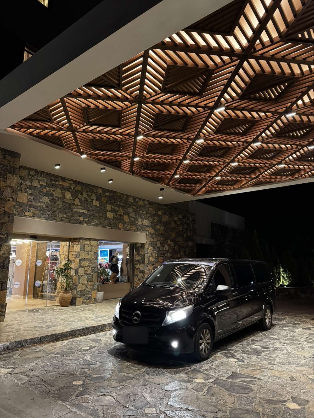 Mercedes Vito at a luxury hotel entrance in Crete at night