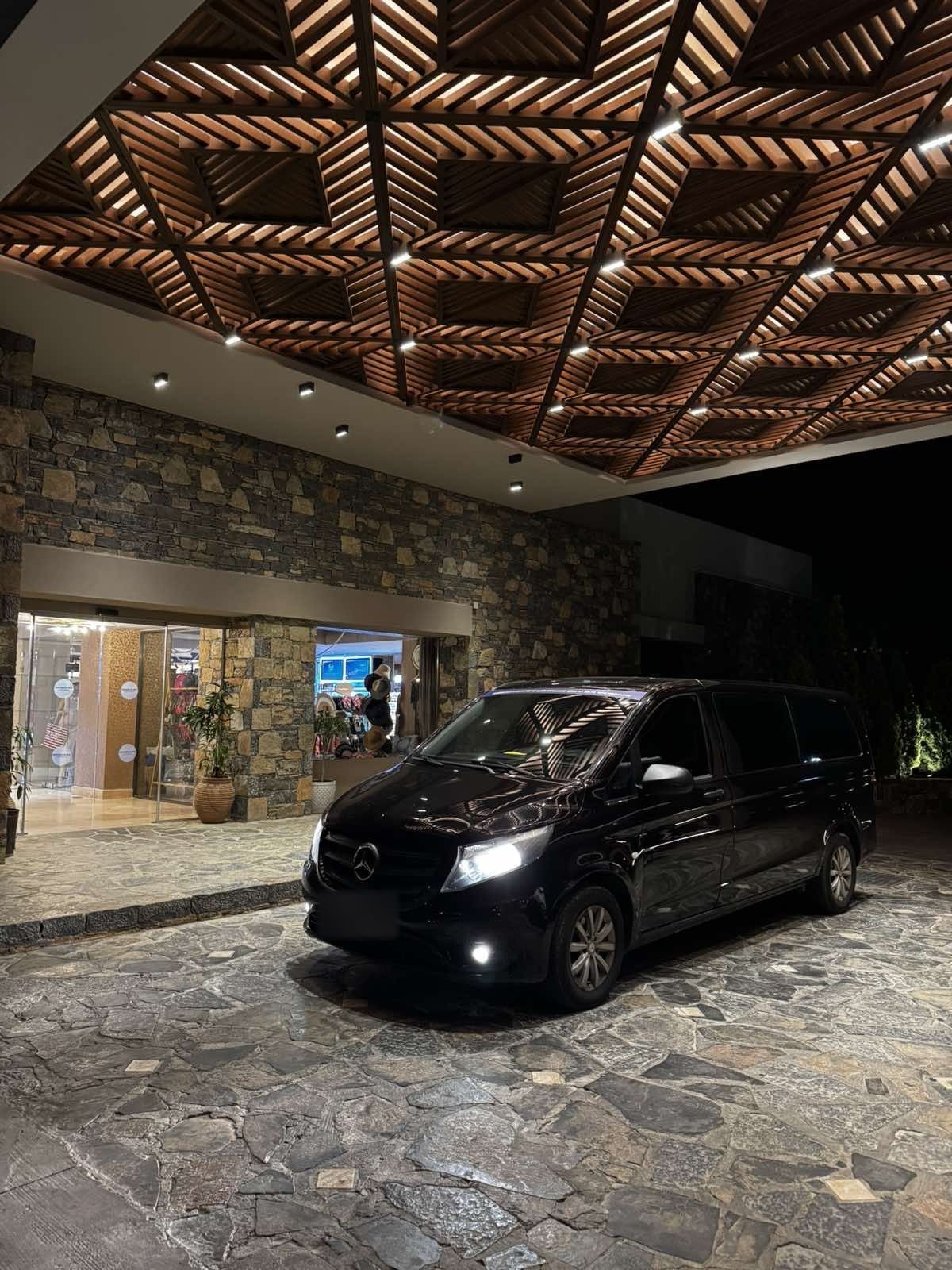 Mercedes Vito at a luxury hotel entrance in Crete at night